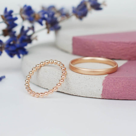 Court Shape and Beaded Rose Gold Wedding Band Set