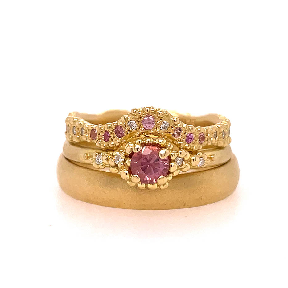 4mm Court Wedding Band in 18ct yellow gold and bespoke contoured wedding band with diamonds and pink sapphires