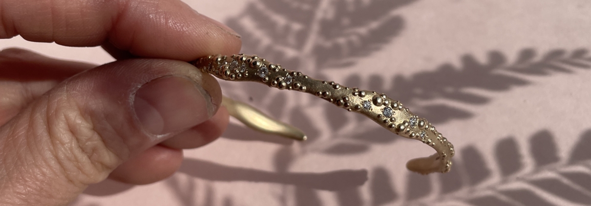 Bespoke heirloom rework of a gold bangle with diamonds